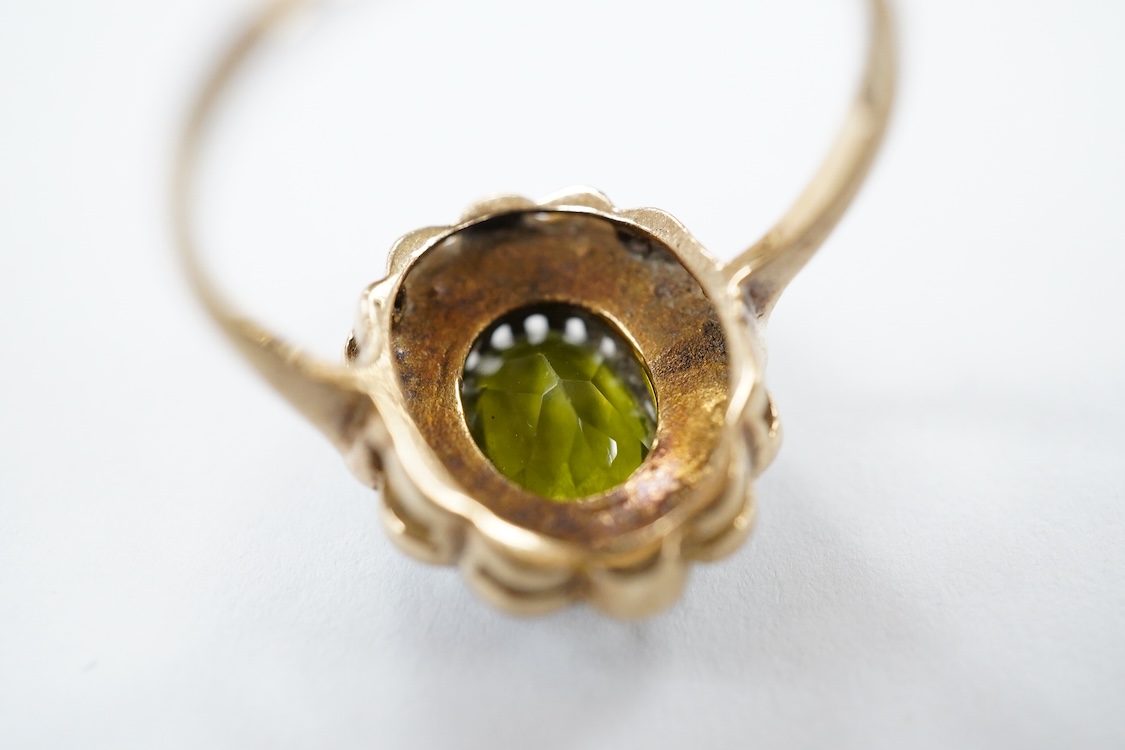 A yellow metal stick pin, the terminal modelled as a Knight's arm holding a scroll(a.f.), 79mm, together with two pairs of yellow metal and gem set ear clips including 9ct and opal doublet.